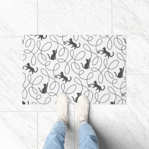 Paillasson Motif de chat noir joueur et boule de fil