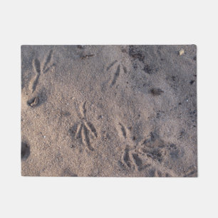 Paillasson Piste de grue de sable dans le sable sur un matela