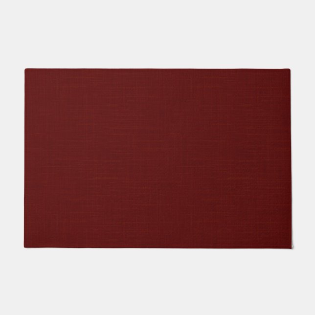 Paillasson Texturé rouge foncé, brun rouge.  (Devant)