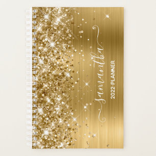 Paillettes dorées et signature girly de papier alu
