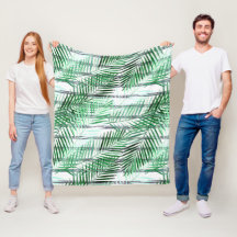 Palm Blätter auf einem schwarz-weiß gestreiften Hi