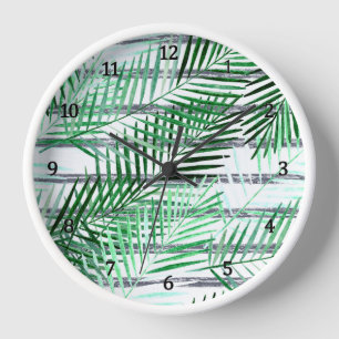 Palm Blätter auf einem schwarz-weiß gestreiften Hi Uhr