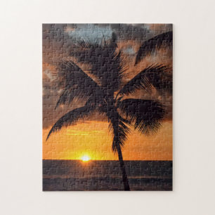 Palme am Sonnenuntergang im Insel-Puzzlespiel