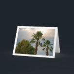 Palmen im Sonnenschirm Karte<br><div class="desc">Palmen in Sunny Sky Portrait Grußkarte. Sie können dieses Produkt ganz einfach kostenlos anpassen, wenn Sie Text hinzufügen oder die Farbe des Hintergrunds ändern möchten.</div>
