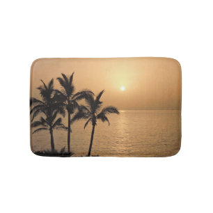 Palmen und romantischer Sonnenuntergang Badematte
