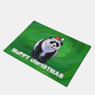 Panda-Bär in der Weihnachtsmannmütze auf Grün Fußmatte
