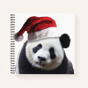 Panda Bear trägt einen Santa Claus-Hut Notizbuch