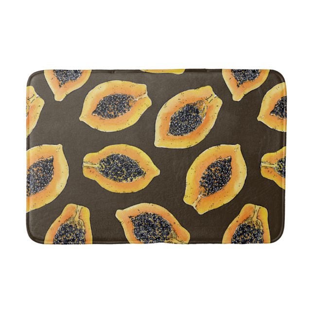 Papaya-Scheiben auf dunkelbraun Badematte (Vorderseite)
