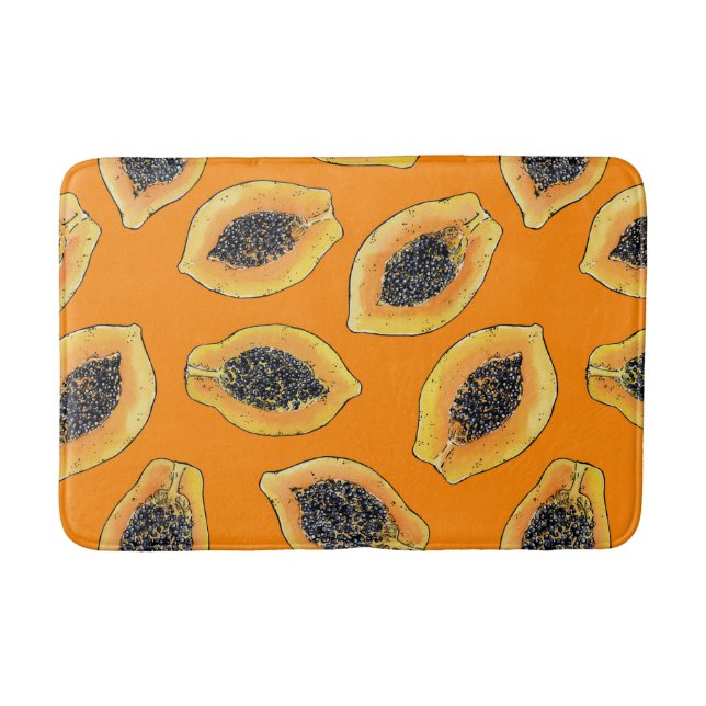 Papaya-Scheiben auf Orange Badematte (Vorderseite)