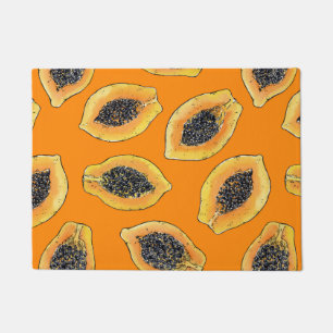 Papaya-Scheiben auf Orange Fußmatte