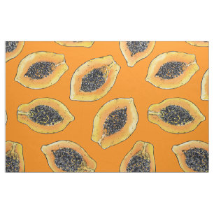Papaya-Scheiben auf Orange Stoff