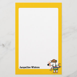 Papeterie Maisy rassemblant des coquilles à la plage