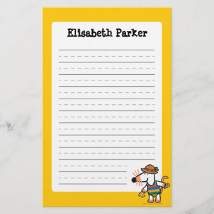 Papeterie Maisy rassemblant des coquilles à la plage