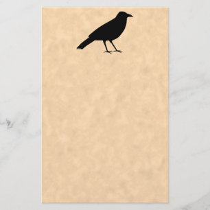 Papeterie Oiseau noir de corneille sur un modèle de