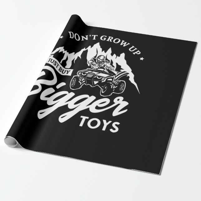 Papier Cadeau 56.Dont Grow Up Just Buy Bigger Toys (Déroulé)