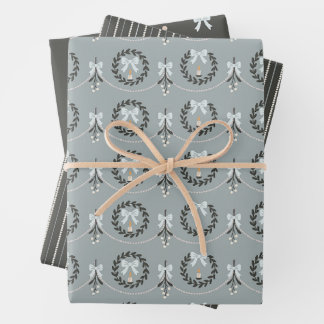 Papier cadeau bleu à motif gui et couronne victori