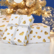Cadeau de cœurs de confettis en or festif
