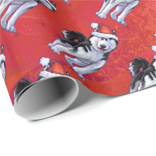 Papier Cadeau Chien de traîneau dans le casquette de Père Noël