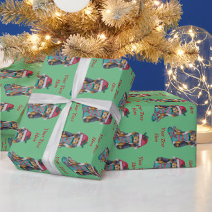 Papier Cadeau chiot noir et brun mignon vêtu pour noël