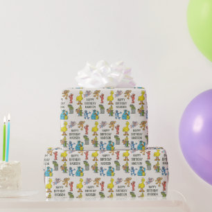 Papier cadeau d'anniversaire avec personnages vint