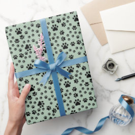 Papier Cadeau Empreintes de pattes noirs sur vert clair