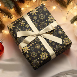 Papier Cadeau Flocon de neige d'or sur Noël Arrière - plan noir