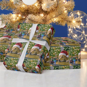 Papier Cadeau Golden Retriever de Noël regardant un train jouet