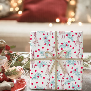 Papier Cadeau Motif de Noël aux rennes fantaisistes et aux baies