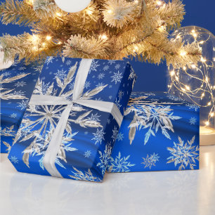 Papier Cadeau Noël aux flocons de neige bleus et argentés