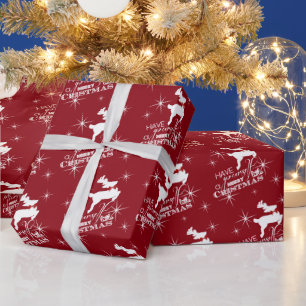 Papier Cadeau Noël des rennes de vol magique (rouge)