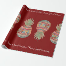 Noël doux d'ananas enveloppant le rouge