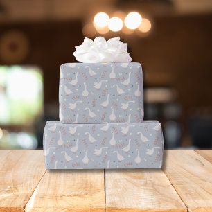 Papier Cadeau Oies mignonnes et motif d'empreintes sur fond bleu