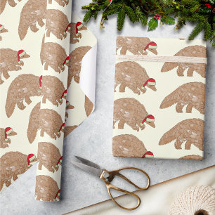 Papier Cadeau Pangolin de Noël portant un chapeau de Père Noël