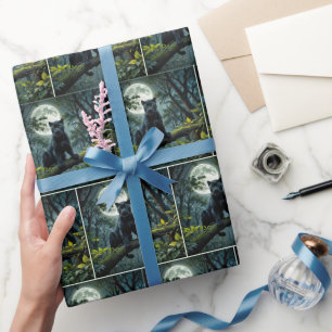 Papier Cadeau Panthère noire sur une branche d'arbre éclairé par