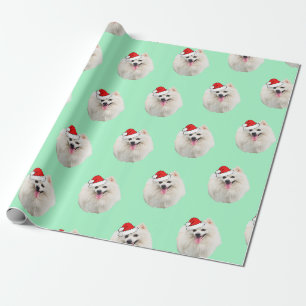Papier Cadeau Pekingese blanc portant un chapeau de Père Noël