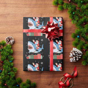 Papier Cadeau Père Noël à cheval sur un requin Noël pyjama migno