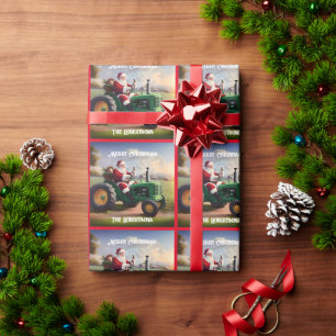 Papier Cadeau Père Noël conduisant un tracteur vert