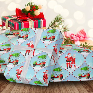 Papier Cadeau Père Noël et Mme Claus jouant au golf motif Ogee
