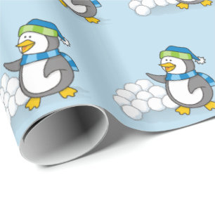 Papier Cadeau Petit pingouin avec boules de neige agitant le sac