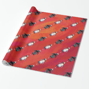 Papier Cadeau Pingouin festif dans un Motif de Santa Hat
