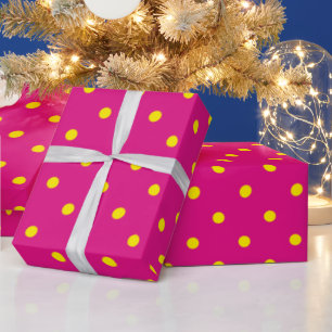 Papier Cadeau Points jaunes sur un fond rose magenta.