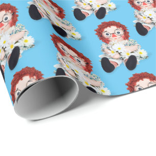Papier Cadeau Poupée en cerf avec marguerites sur bleu