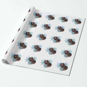 Papier Cadeau Retriever à manteau plat dans les flocons de neige