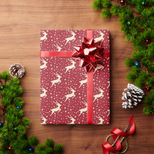 Papier Cadeau Rouge avec rennes blancs & étoiles Noël