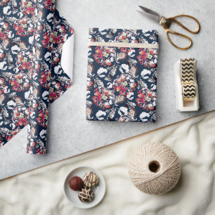 Papier Cadeau Rouge, fleurs blanches sur bleu.
