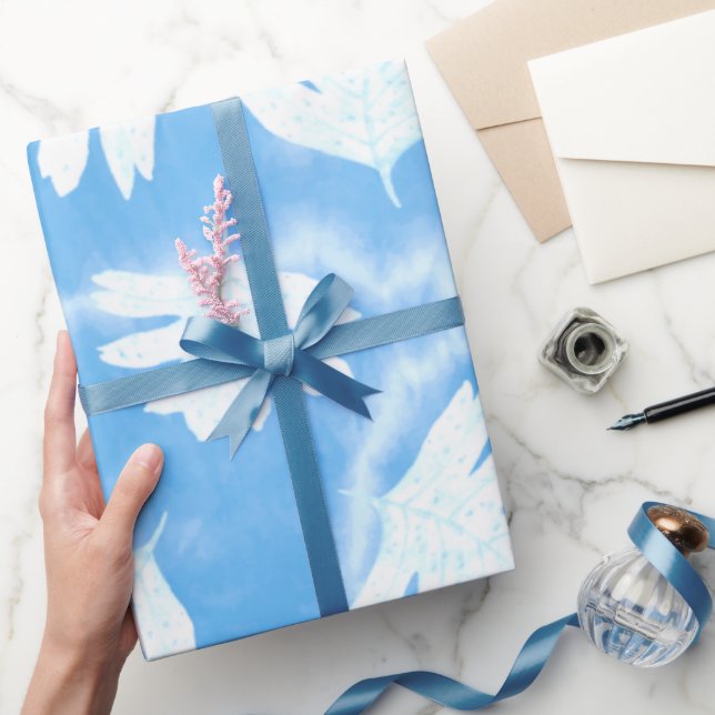 PAPIER CADEAU SIMPLE SKI BLEU AVEC COULEUR D'EAU FEUILLE BLANCHE (Cadeaux)