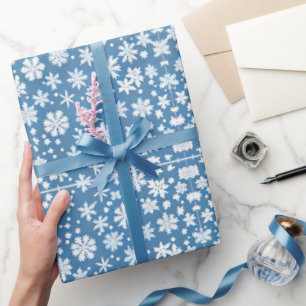 Papier Cadeau Snowflakes répétant le motif blanc bleu