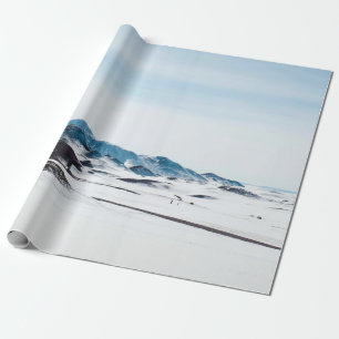PAPIER CADEAU TERRE COUVERTE DE NEIGE PENDANT LA JOURNÉE