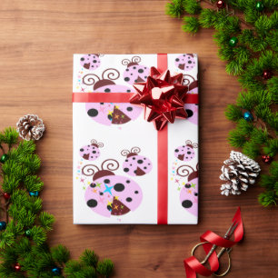Papier Cadeau Trois coccinelle rose et noire avec étoiles