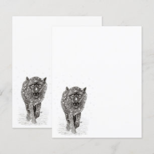 Papier Loup noir en colère dans la neige, hiver sauvage